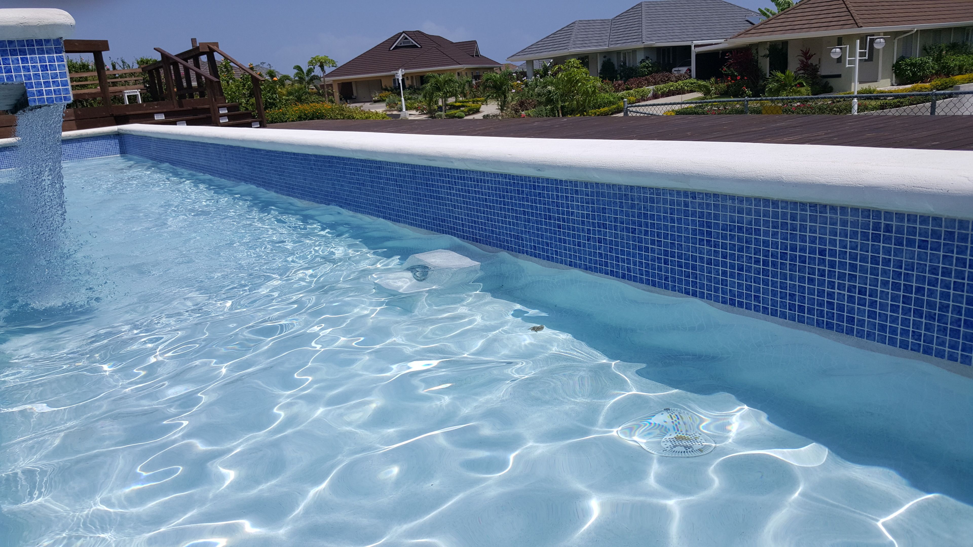 Outdoor pool, pool umbrellas, pool loungers