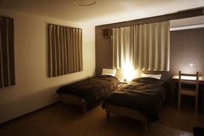 Down duvets, blackout curtains, rollaway beds, free WiFi