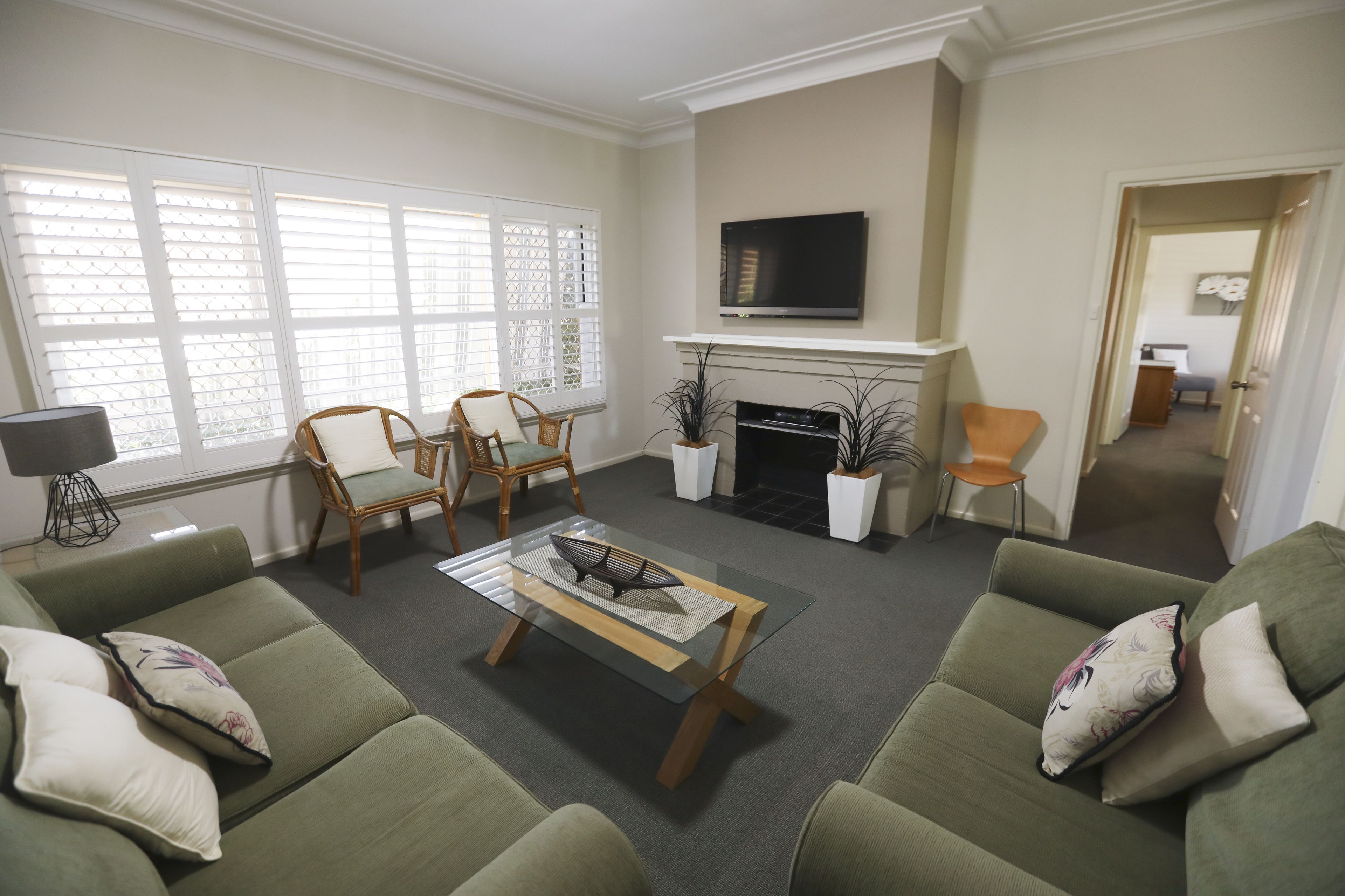 Luxury Cottage, 2 Bedrooms, Garden View | Living area | 55-cm flat-screen TV with satellite channels, TV, DVD player