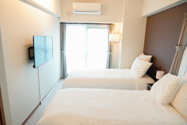 Standard Twin Room | 3 bedrooms, laptop workspace, blackout curtains, free WiFi - Grandouce Hakata (Fukuoka)