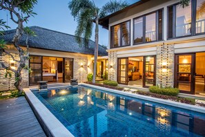 Outdoor pool, pool umbrellas, pool loungers
