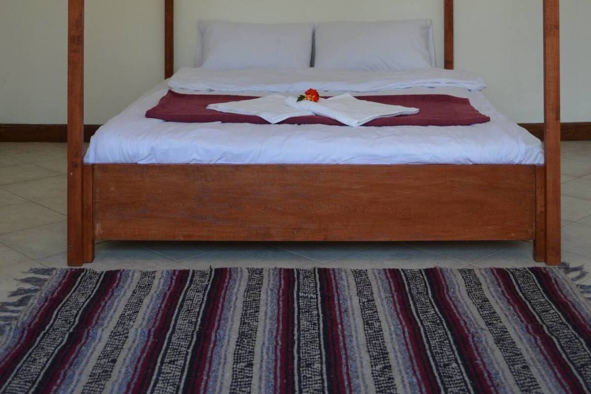 Double Room, Shared Bathroom, Garden View | In-room safe, rollaway beds (surcharge), bed sheets