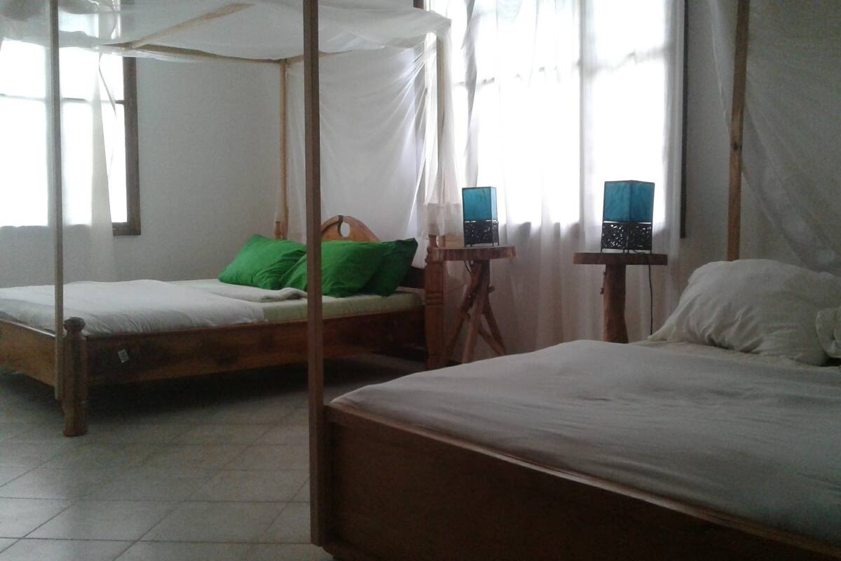 Family Room, Shared Bathroom | In-room safe, rollaway beds (surcharge), bed sheets