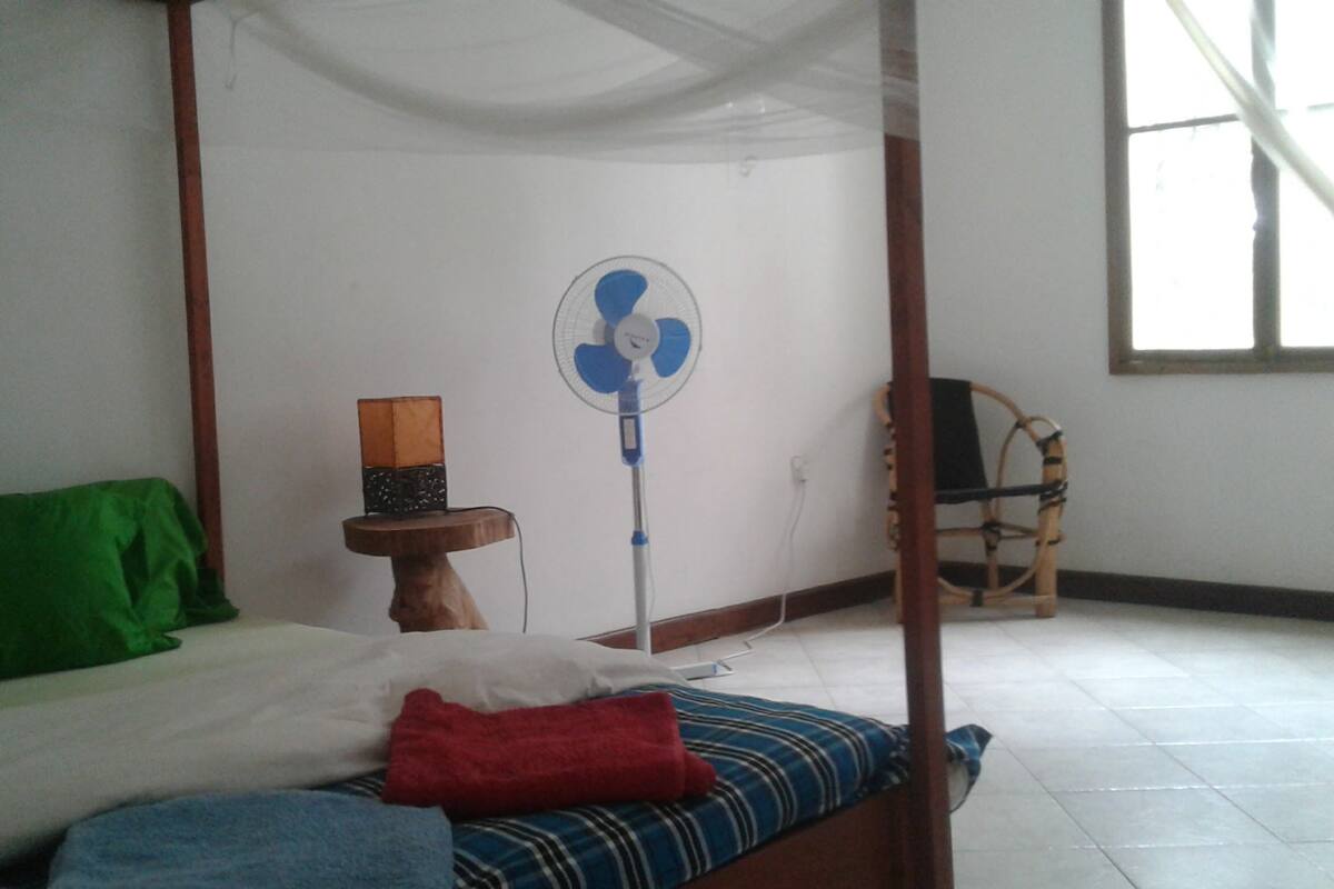 Economy Double Room, Shared Bathroom | In-room safe, rollaway beds (surcharge), bed sheets
