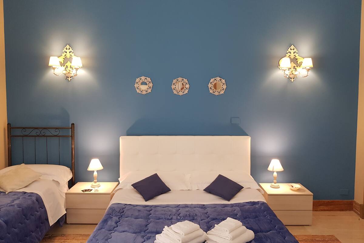 Family Quadruple Room, City View | In-room safe, desk, soundproofing, iron/ironing board (on request)