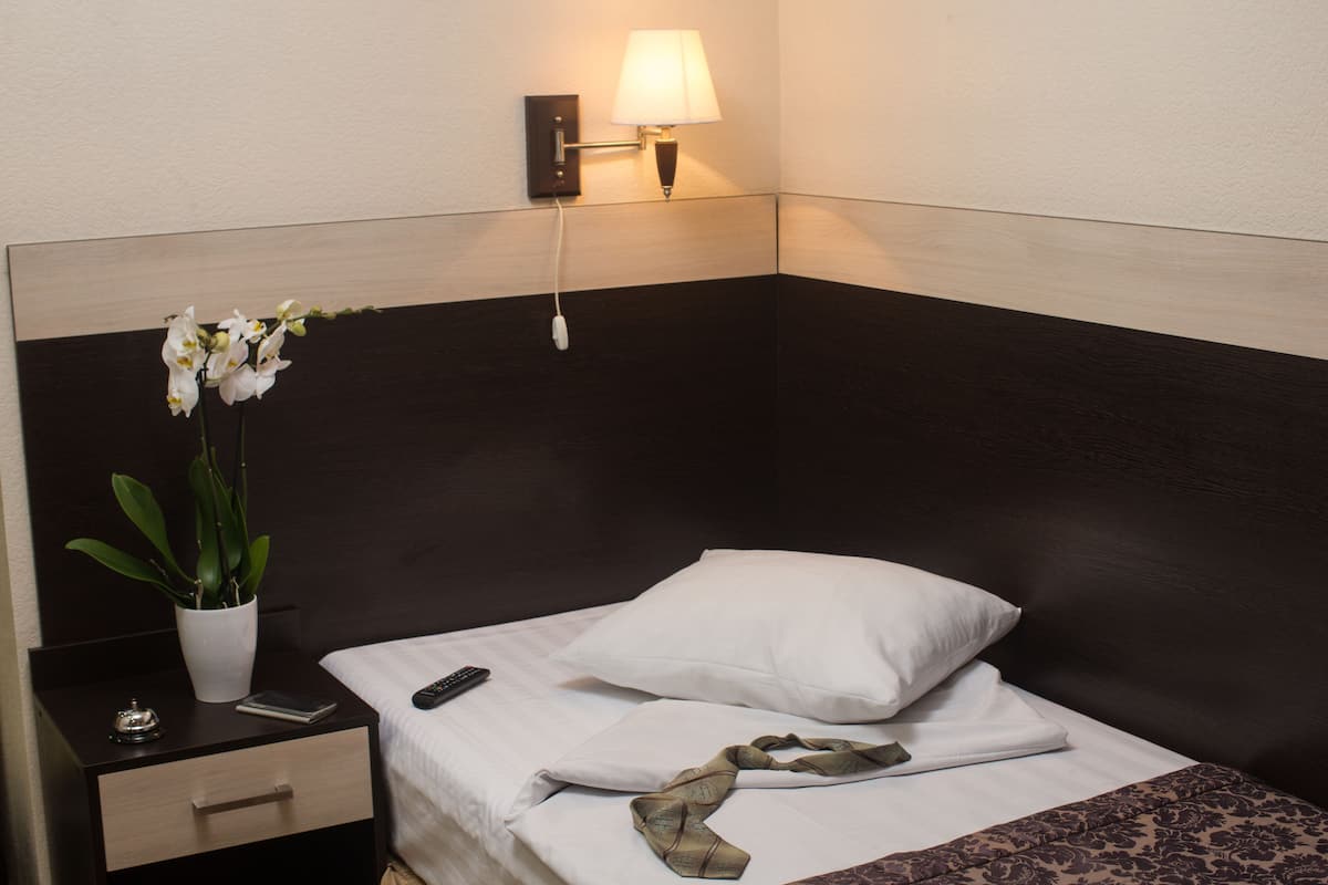 Quarto solteiro standard | 1 quarto, escrivaninha, ferros/tábuas de passar roupa, Wi-Fi de cortesia