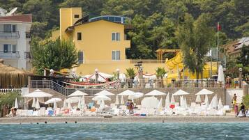 Private beach, sun loungers, beach umbrellas, beach volleyball