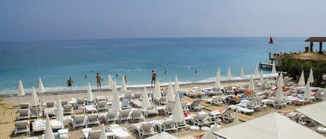 Private beach, sun-loungers, beach umbrellas, beach volleyball