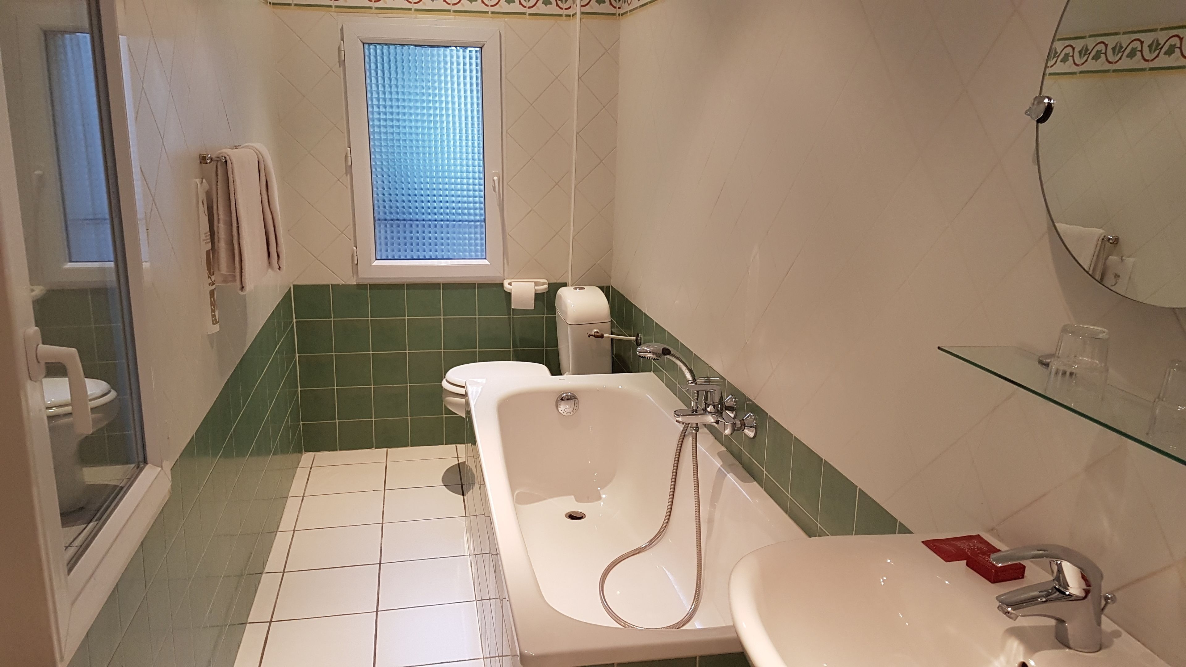 basic double or twin room | bathroom | separate bathtub and shower, free toiletries, hair dryer, towels