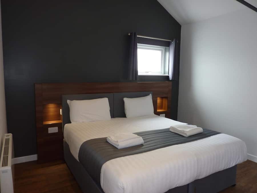 Hypo-allergenic bedding, individually furnished, blackout curtains