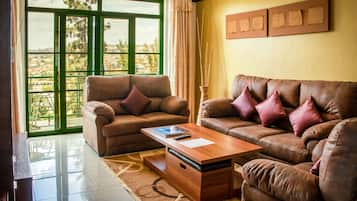Suite, 2 Bedrooms | Living area | Flat-screen TV