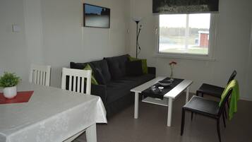 Cabaña | Área de sala de estar | Televisión de pantalla plana