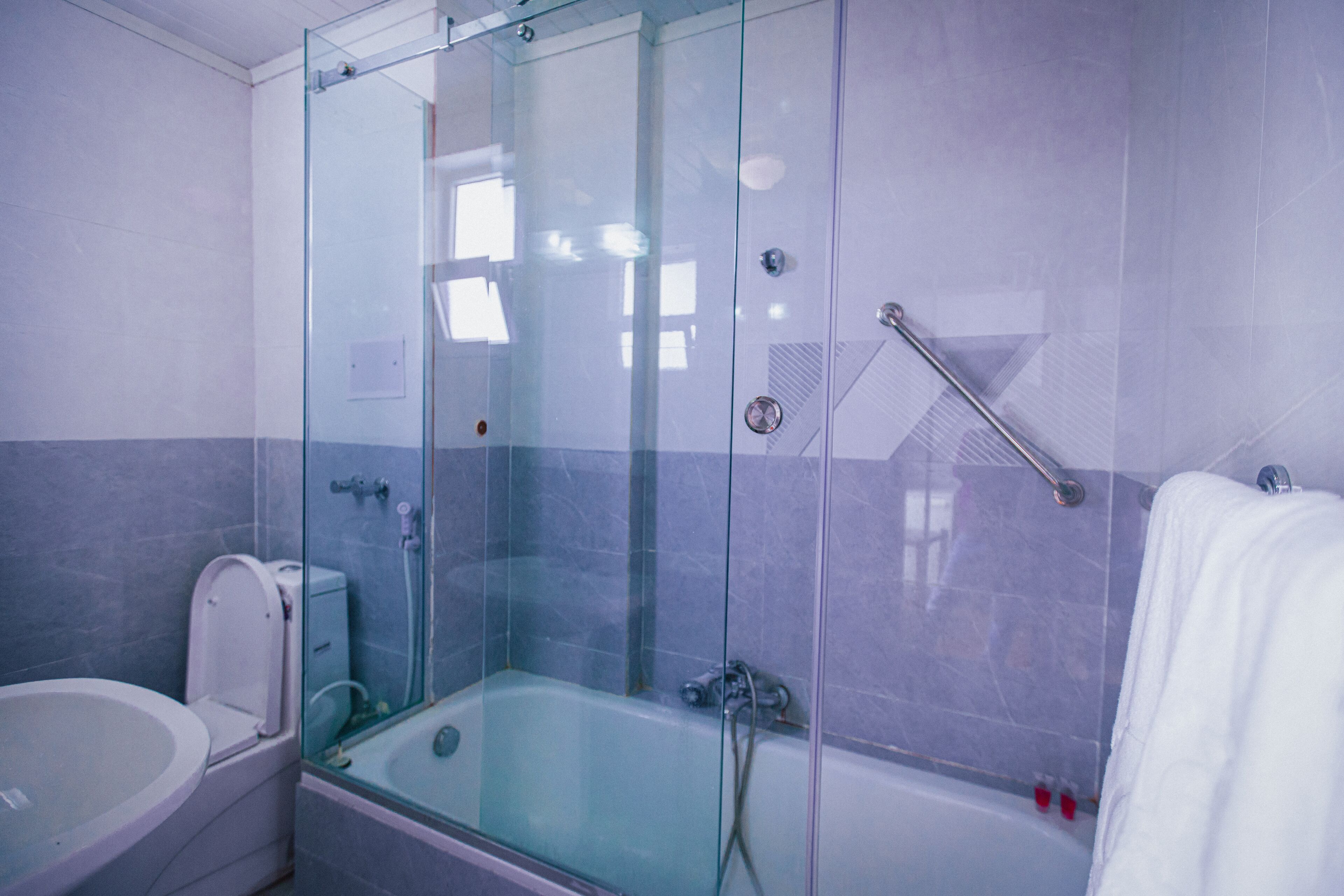 Deep soaking tub, rainfall showerhead, free toiletries, slippers