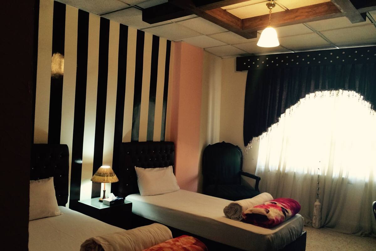 In-room safe, soundproofing, iron/ironing board, rollaway beds
