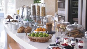 A buffet with various food items and beverages. - Grand Beach Hotel Bay Harbor (Bay Harbor Islands)