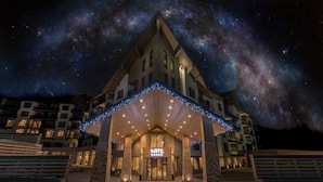 A hotel with a distinctive triangular roof and a marquee entrance. - Arte Spa & Park Hotel (Velingrad)