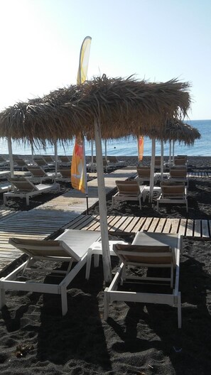 On the beach - Dolphins (Santorini)