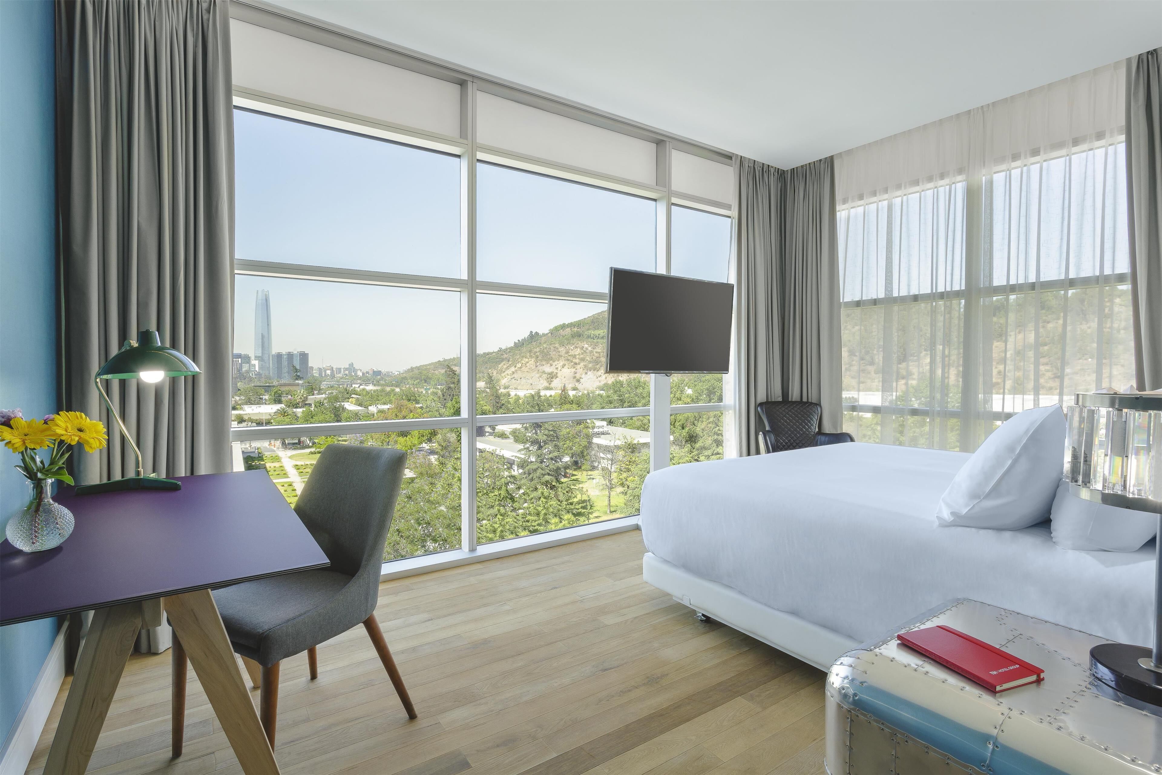 premium room, city view | 1 bedroom, in-room safe, desk, blackout curtains