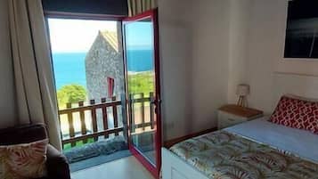 Premium bedding, blackout curtains, soundproofing, iron/ironing board