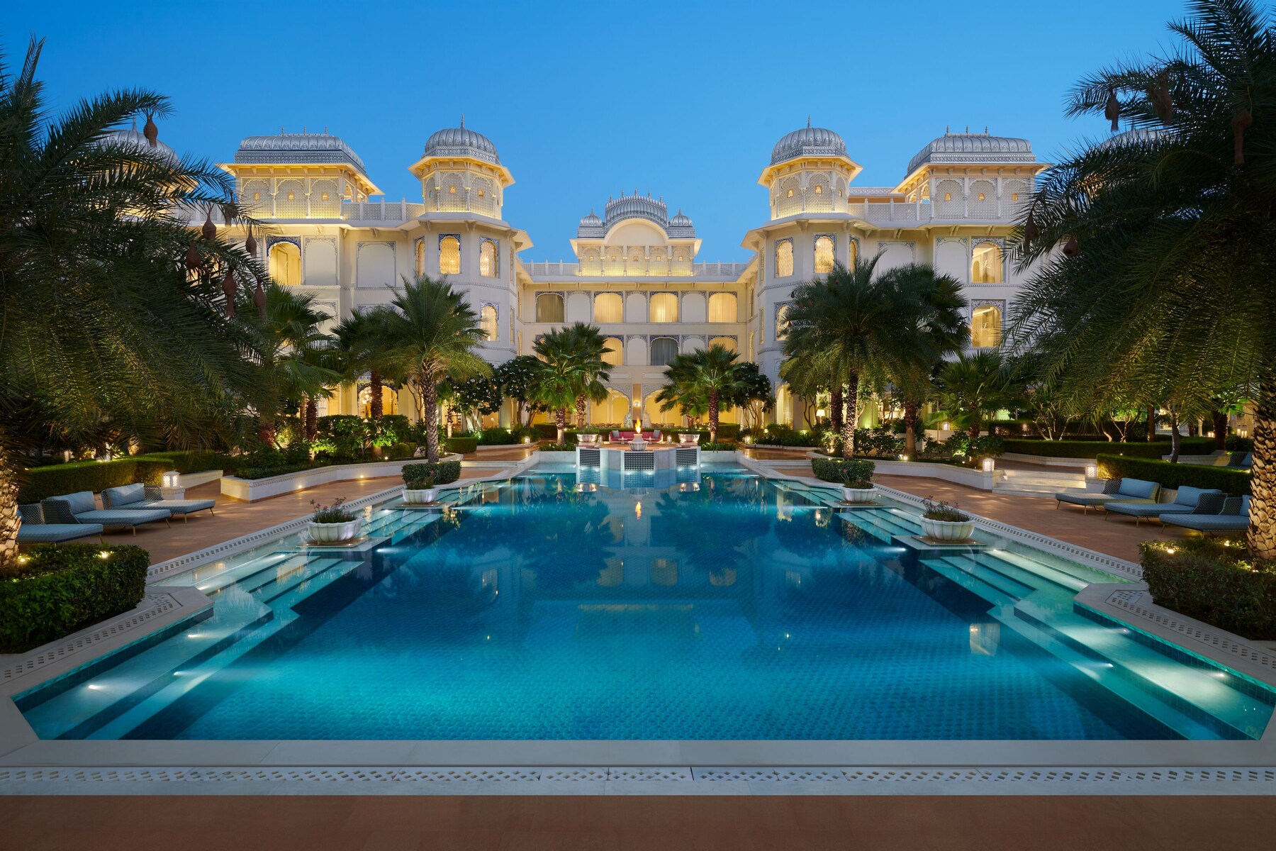Outdoor pool, open 7 AM to 8 PM, pool umbrellas, pool loungers