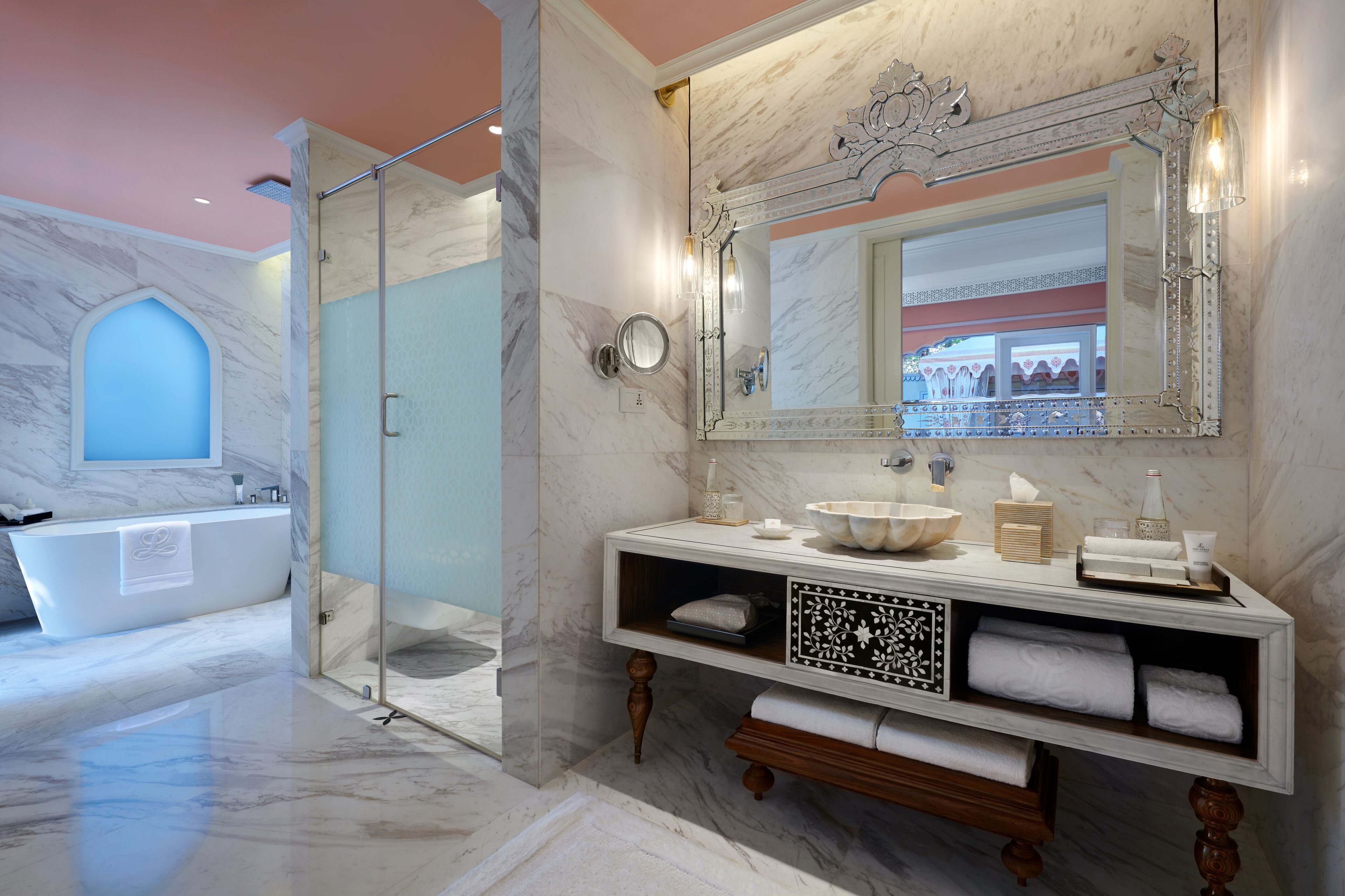separate bathtub and shower, deep-soaking bathtub, designer toiletries