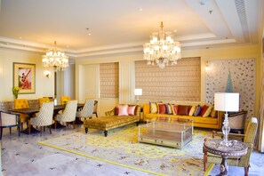 Suite (Maharaja) | Living area | 49-inch LED TV with digital channels, TV, iPod dock - The Leela Palace Jaipur (Amer)