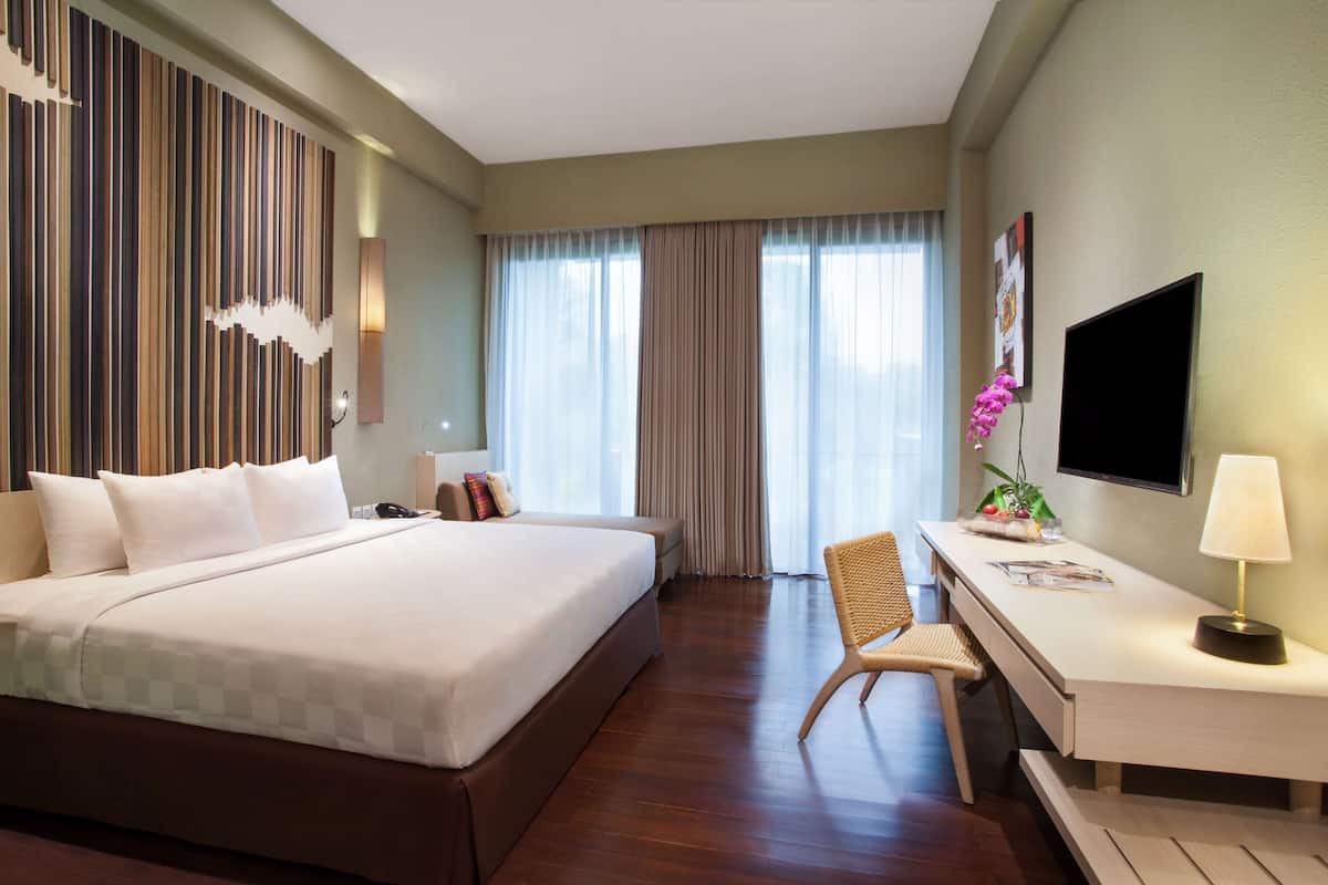Deluxe kamer, 1 kingsize bed | Een kluis op de kamer, individueel gedecoreerd, individueel gemeubileerd
