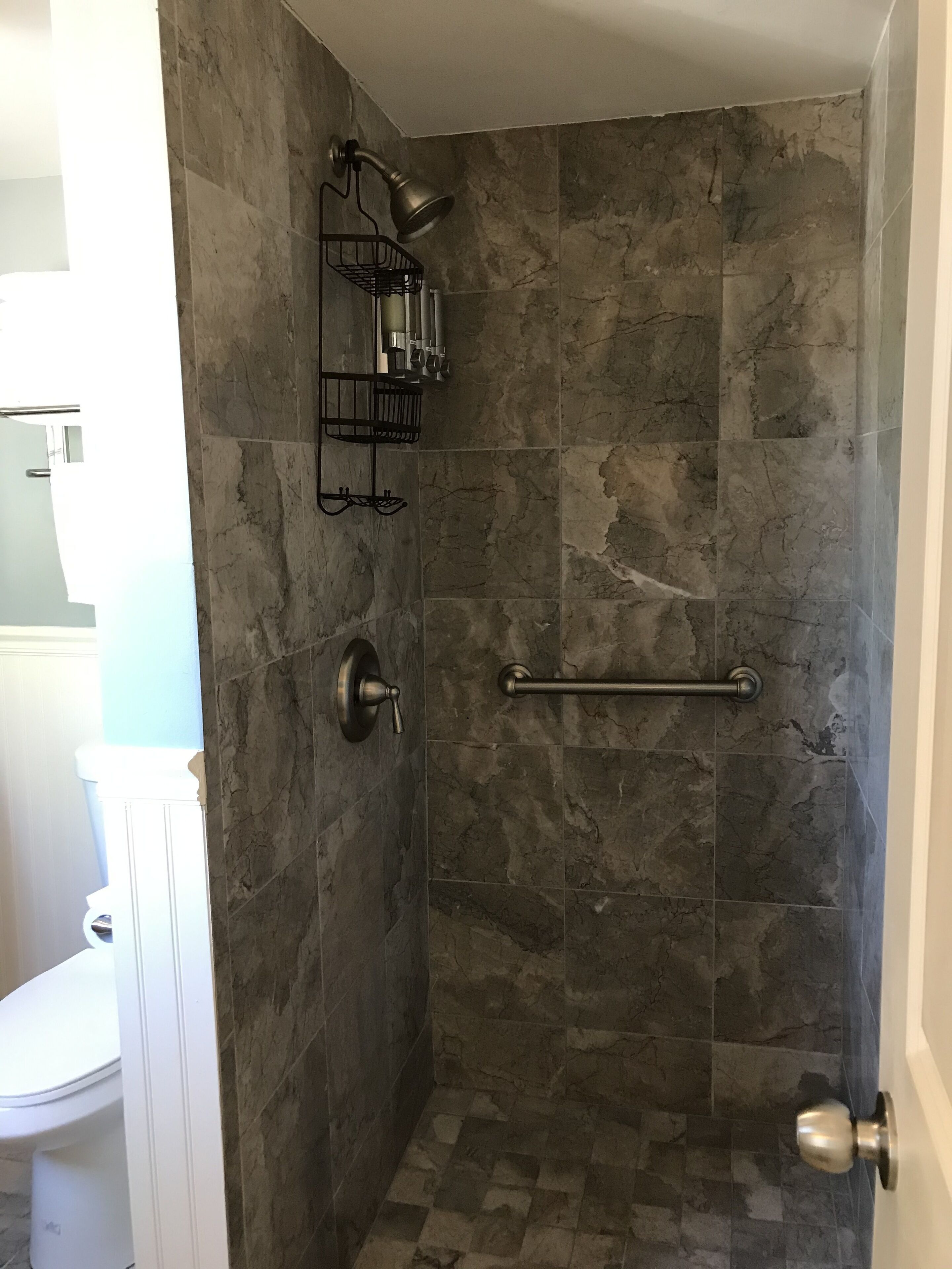 signature room, 1 king bed with sofa bed, non smoking (mcguire suite) | bathroom shower