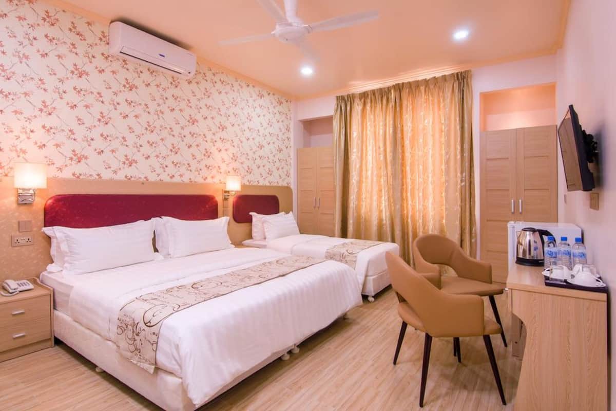 Superior Triple Room, 1 Bedroom, Sea View | Minibar, in-room safe, desk, blackout drapes