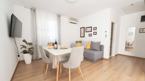 Signature Apartment, 2 Bedrooms, Terrace, Sea View | Living area - Apartments Biserka (Novalja)