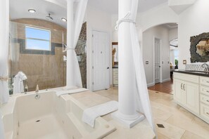 Combined shower/tub, jetted tub, hair dryer, towels