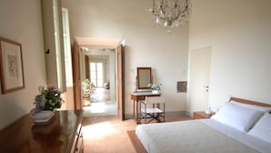 A bedroom with a bed, a desk, a chair, and a dresser. - Renaissance Villa of the Aqueduct 1hr from Rome. Lazio-Umbria border  (Orte)