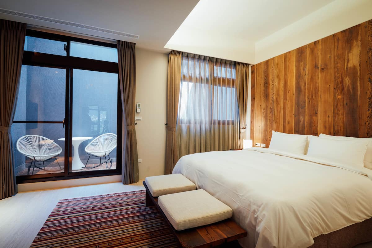 Deluxe tweepersoonskamer | Luxe beddengoed, donsdekens, een gratis minibar, individueel gedecoreerd