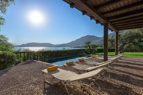 Beachfront Villa few steps away from a sandy beach