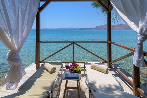 Beachfront Villa few steps away from a sandy beach