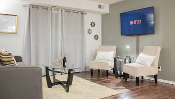 Luxury Condo, 2 Bedrooms | Living room | Flat-screen TV