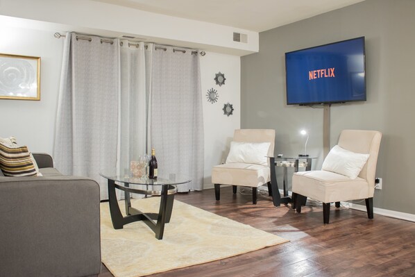 Luxury Condo, 2 Bedrooms | Living room | Flat-screen TV