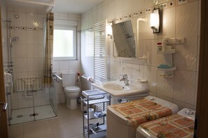 Shower, hair dryer, towels