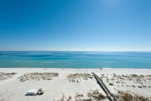On the beach, sun loungers, beach towels