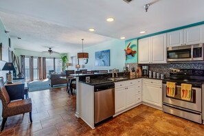 Fridge, microwave, oven, stovetop - Gulf Front Condo with Luxury Furnishings and Beach Chairs  (Pensacola Beach)