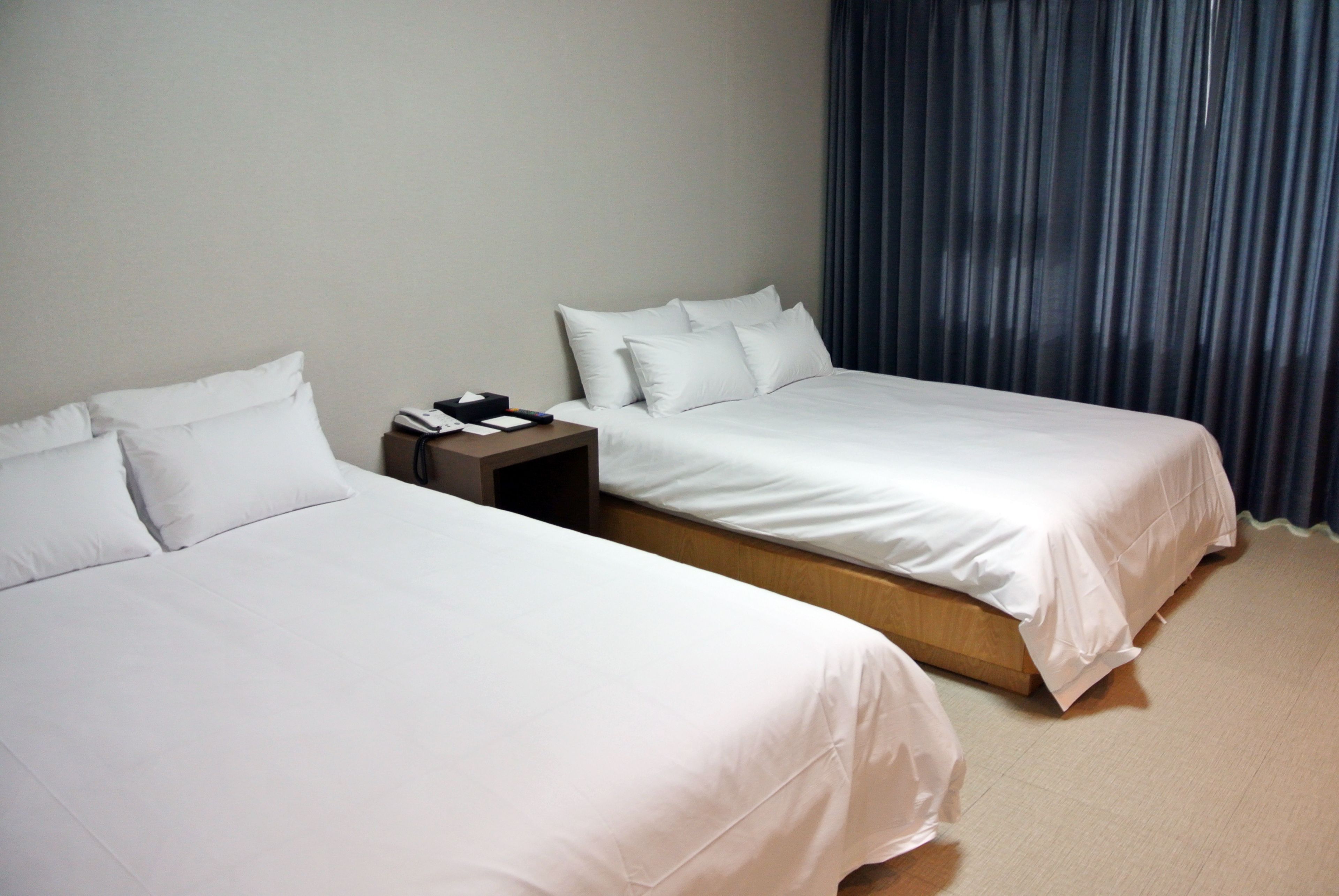 family twin room (deluxe) | 1 bedroom, in-room safe, desk, blackout curtains