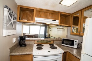 Fridge, microwave, coffee/tea maker, toaster