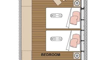 A bedroom with two beds, a shower, and a bathroom.