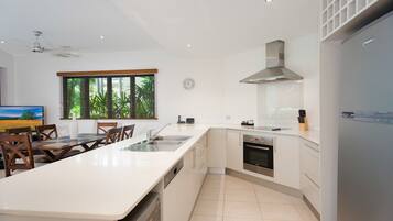 Premium Apartment, 2 Bedrooms, Beachfront | Private kitchen | Full-size fridge, microwave, oven, stovetop