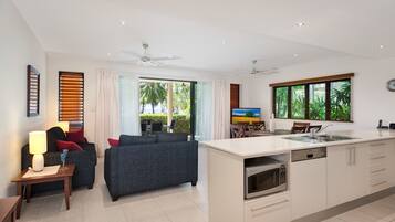 Premium Apartment, 2 Bedrooms, Beachfront | Living area | 55-inch Smart TV with premium channels, TV, Netflix