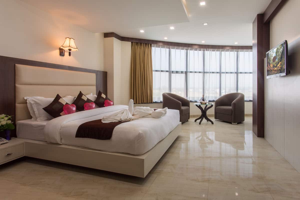 Presidentiële suite | Luxe beddengoed, een minibar, een kluis op de kamer