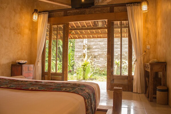 Habitación Deluxe | Escritorio, camas supletorias, wifi gratis