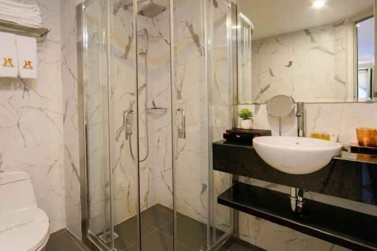 Bathroom | Shower, free toiletries, hair dryer, towels
