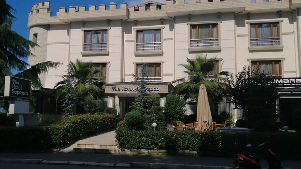 A hotel with a castle-like facade, multiple windows, and a sign reading "The Hotel Sapanca." - The Hotel Sapanca (Sapanca)