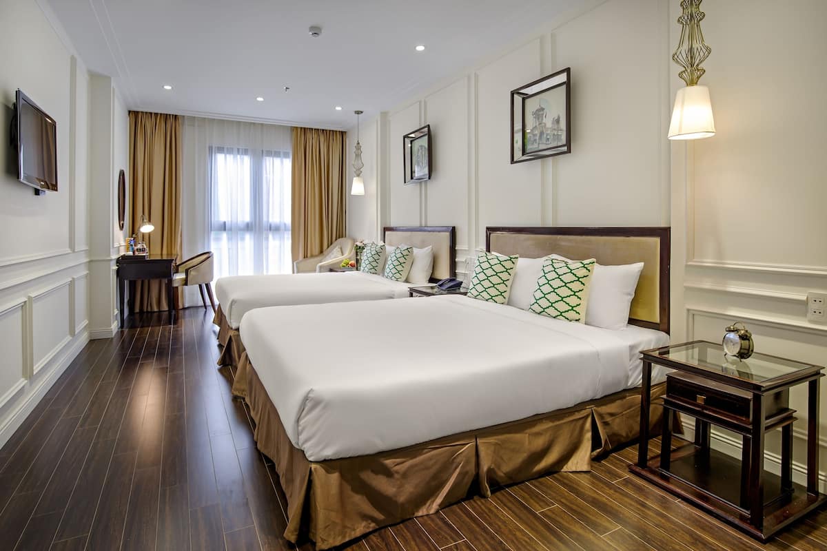 Deluxe-Vierbettzimmer | Zimmerausstattung